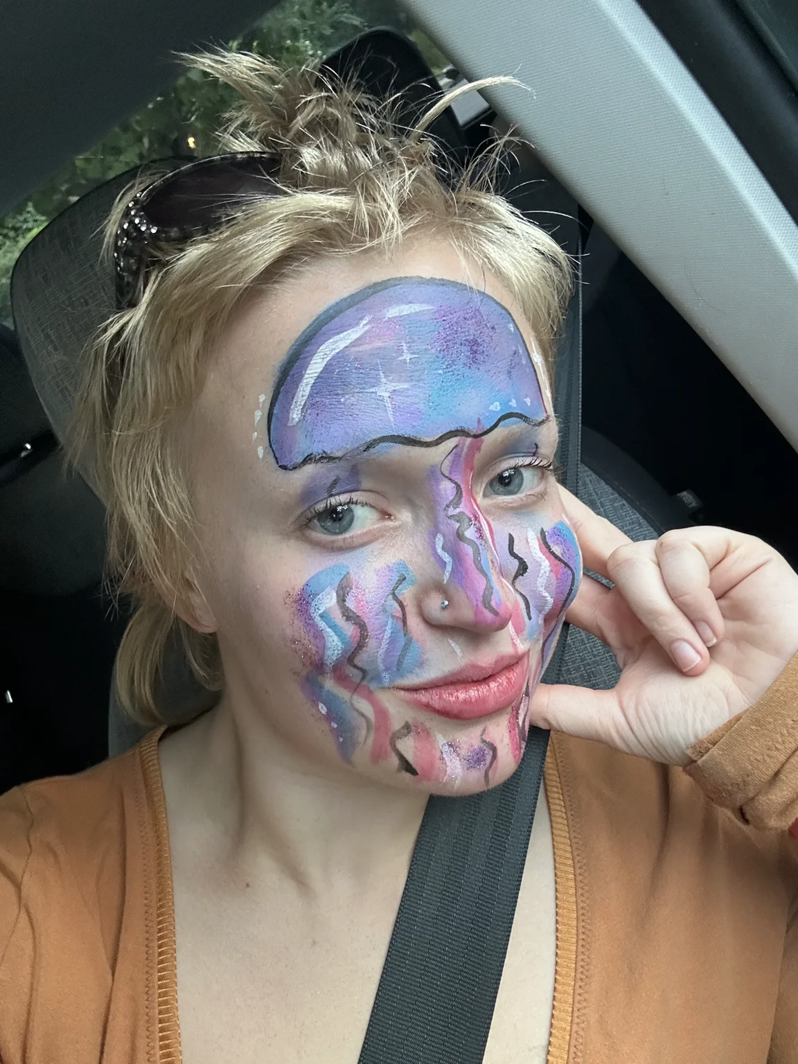 Anna wearing playful jellyfish face paint